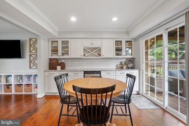 9977 Mallow Ct, Manassas, VA 20110 - dining area with hardwood / wood-style floors, ornamental molding, and recessed lighting