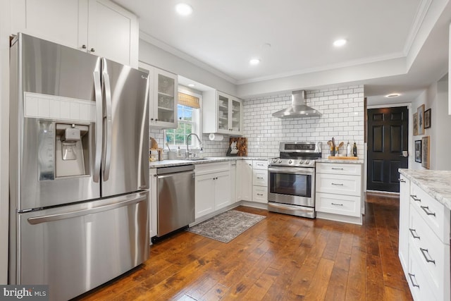 9977 Mallow Ct, Manassas, VA 20110 - kitchen with appliances with stainless steel finishes, wall chimney range hood, backsplash, a sink, and light stone counters