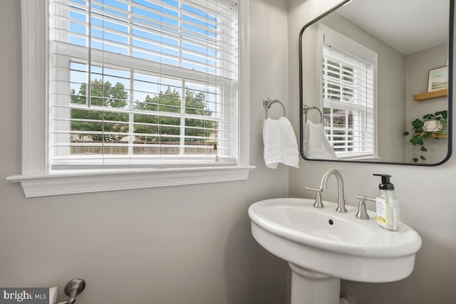 9977 Mallow Ct, Manassas, VA 20110 - bathroom with plenty of natural light and a sink