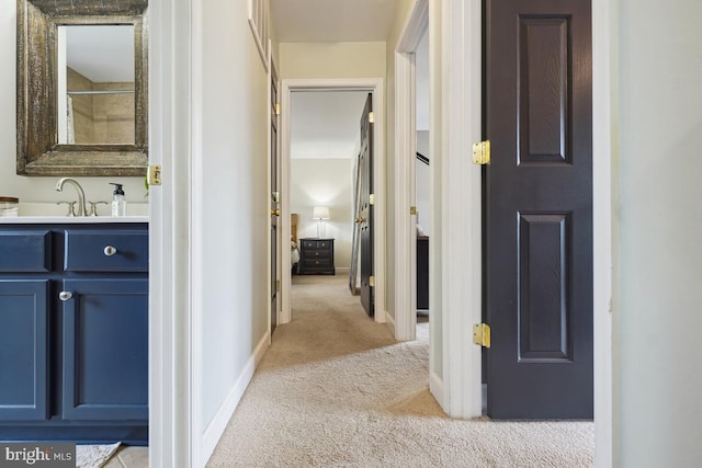 9977 Mallow Ct, Manassas, VA 20110 - hallway with light carpet and baseboards