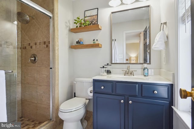 9977 Mallow Ct, Manassas, VA 20110 - bathroom with vanity, toilet, and a stall shower