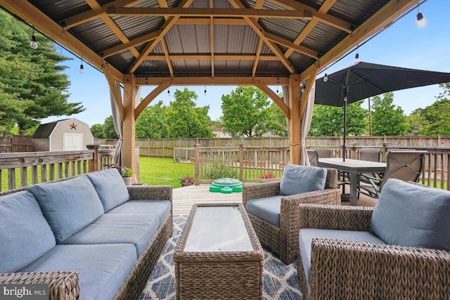 9977 Mallow Ct, Manassas, VA 20110 - view of patio featuring outdoor lounge area, a gazebo, outdoor dining area, and a wooden deck