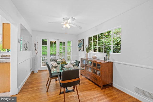 8008 Park Crest Dr, Silver Spring, MD 20910 - dining area featuring ceiling fan, healthy amount of natural light, and light wood-style floors