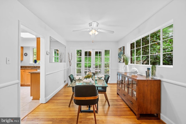 8008 Park Crest Dr, Silver Spring, MD 20910 - dining area with ceiling fan, french doors, and light wood-style floors