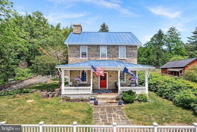 36930 Charles Town, Purcellville, VA 20132 - view of front of property featuring a standing seam roof, stone siding, covered porch, and a chimney