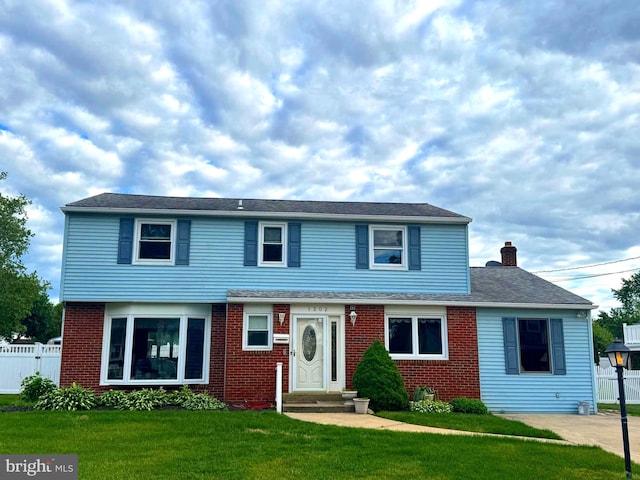 1202 Noreen Dr, Burlington, NJ 08016 - view of front of house featuring brick siding, a chimney, and entry steps