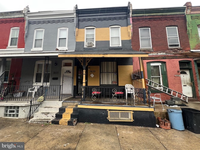 3833 Wyalusing Ave, Philadelphia, PA 19104 - view of property with brick siding and a porch