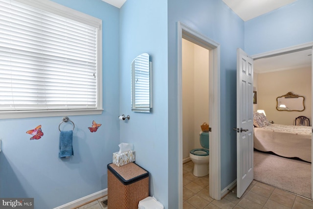 5353 Walkerwood Ct, Manchester, MD 21102 - ensuite bathroom with toilet and tile patterned flooring