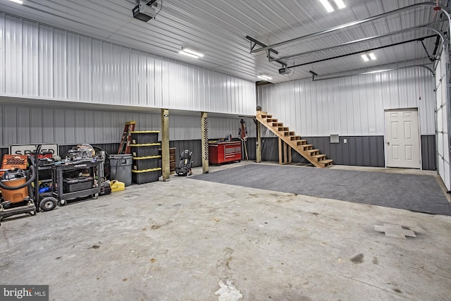 5000 Ogletown Stanton Rd, Newark, DE 19713 - garage featuring metal wall and a garage door opener