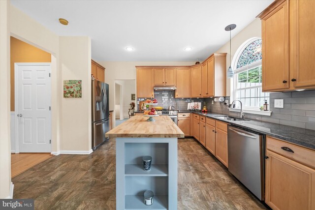 42 Manassas Dr, Middletown, DE 19709 - kitchen with stainless steel appliances, wood counters, open shelves, a sink, and decorative backsplash
