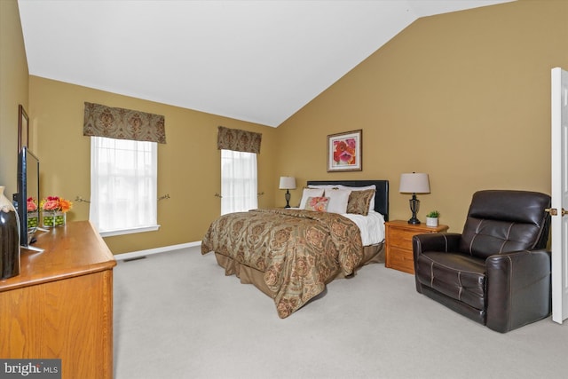 42 Manassas Dr, Middletown, DE 19709 - bedroom with light carpet, vaulted ceiling, and baseboards
