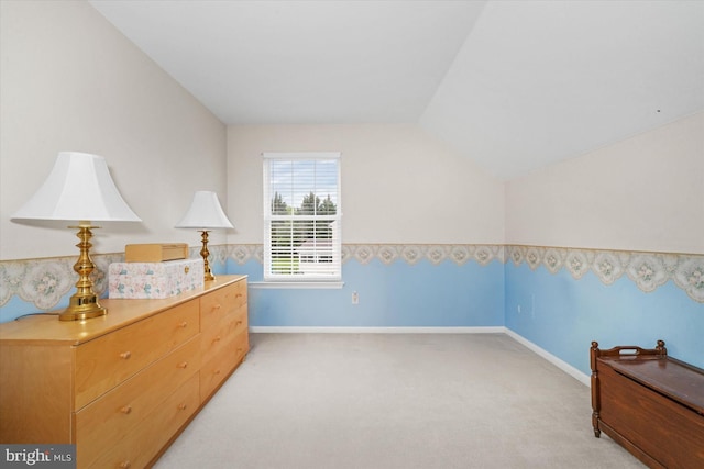 42 Manassas Dr, Middletown, DE 19709 - bedroom featuring light colored carpet, vaulted ceiling, and baseboards