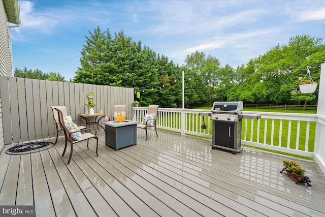42 Manassas Dr, Middletown, DE 19709 - wooden terrace with a grill and a fire pit