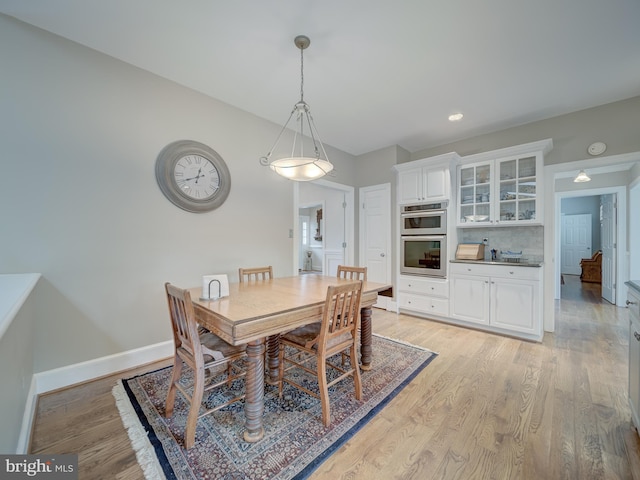 4387 Stepney Dr, Gainesville, VA 20155 - dining room with baseboards and light wood-type flooring