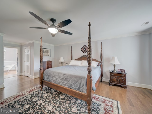 4387 Stepney Dr, Gainesville, VA 20155 - bedroom with wood finished floors, crown molding, baseboards, and a ceiling fan