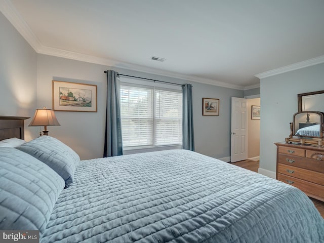 4387 Stepney Dr, Gainesville, VA 20155 - bedroom with ornamental molding, dark wood finished floors, and baseboards