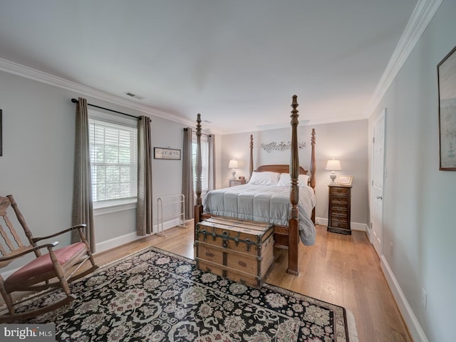 4387 Stepney Dr, Gainesville, VA 20155 - bedroom with light wood finished floors, crown molding, and baseboards