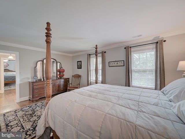 4387 Stepney Dr, Gainesville, VA 20155 - bedroom with crown molding, wood finished floors, and baseboards