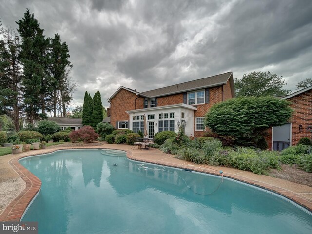 4387 Stepney Dr, Gainesville, VA 20155 - outdoor pool featuring a patio area