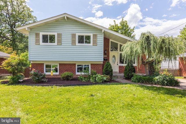 11830 Charles Rd, Silver Spring, MD 20906 - view of front of property with brick siding and a front lawn