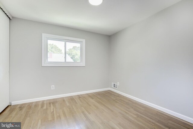 11830 Charles Rd, Silver Spring, MD 20906 - empty room with wood finished floors and baseboards