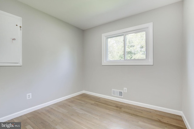 11830 Charles Rd, Silver Spring, MD 20906 - spare room featuring baseboards and wood finished floors
