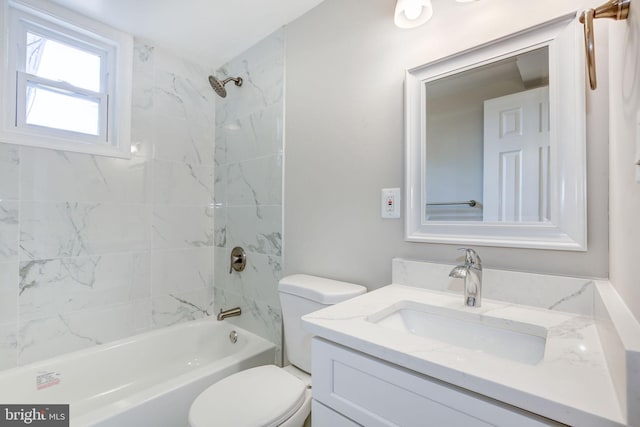 11830 Charles Rd, Silver Spring, MD 20906 - bathroom with toilet, vanity, and bathtub / shower combination