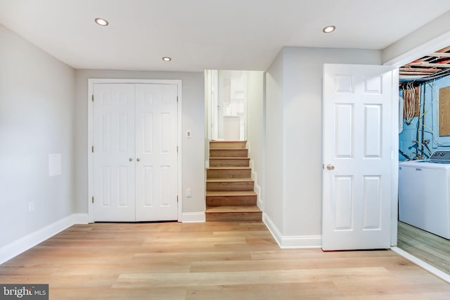 11830 Charles Rd, Silver Spring, MD 20906 - stairway featuring washer / clothes dryer, recessed lighting, wood finished floors, and baseboards