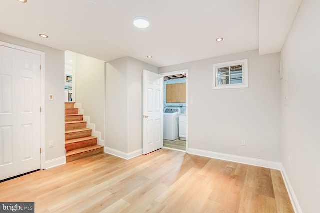 11830 Charles Rd, Silver Spring, MD 20906 - below grade area with washer / dryer, light wood finished floors, baseboards, recessed lighting, and stairway
