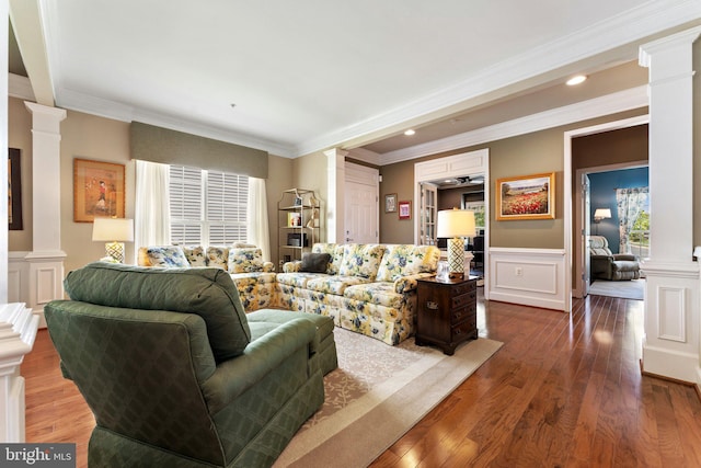 70 Battery Point Dr, Fredericksburg, VA 22406 - living room with ornate columns, dark wood-style flooring, ornamental molding, a decorative wall, and a wainscoted wall