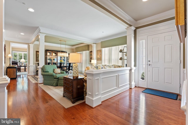 70 Battery Point Dr, Fredericksburg, VA 22406 - foyer entrance featuring ornate columns, crown molding, wood finished floors, recessed lighting, and a decorative wall