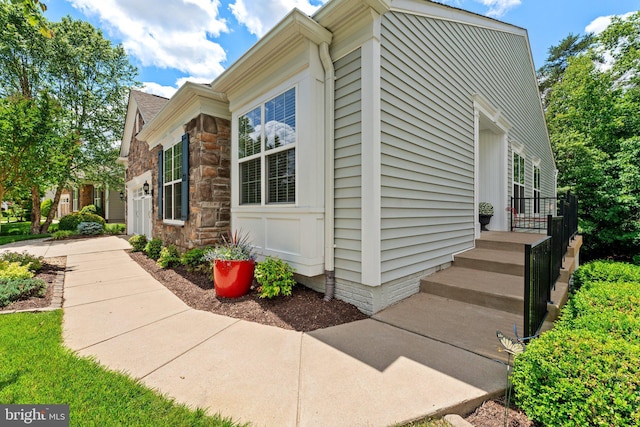 70 Battery Point Dr, Fredericksburg, VA 22406 - view of side of property with stone siding