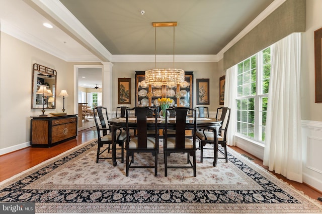 70 Battery Point Dr, Fredericksburg, VA 22406 - dining area with wood finished floors, ornate columns, a chandelier, and crown molding