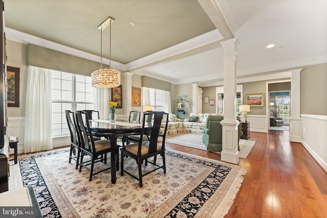 70 Battery Point Dr, Fredericksburg, VA 22406 - dining area featuring ornate columns, crown molding, a wainscoted wall, and wood finished floors