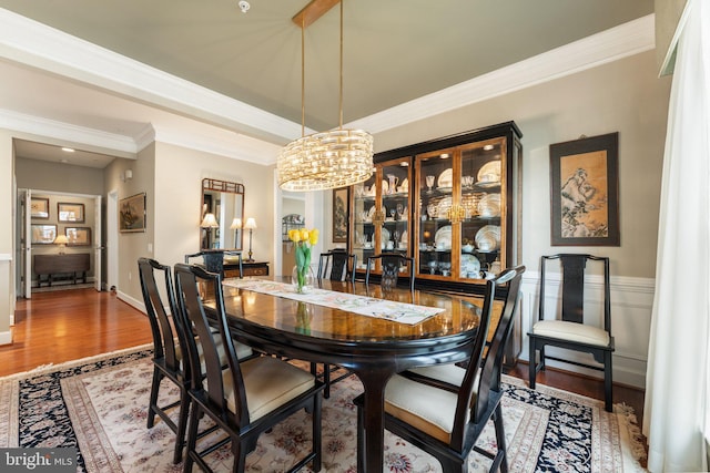 70 Battery Point Dr, Fredericksburg, VA 22406 - dining room featuring a chandelier, wood finished floors, ornamental molding, and baseboards