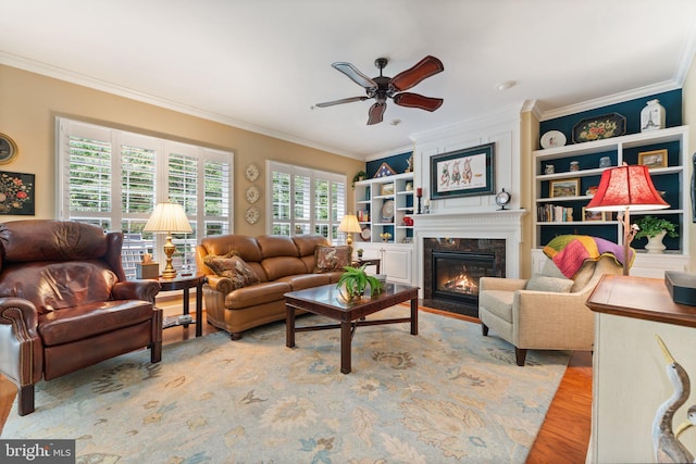 70 Battery Point Dr, Fredericksburg, VA 22406 - living room featuring a ceiling fan, ornamental molding, a premium fireplace, and wood finished floors