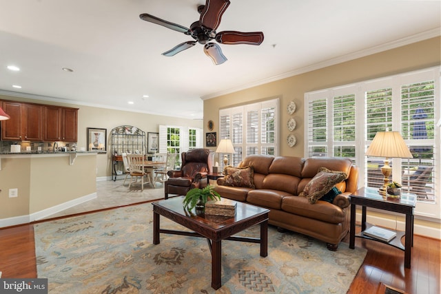 70 Battery Point Dr, Fredericksburg, VA 22406 - living area with crown molding, ceiling fan, baseboards, recessed lighting, and light wood finished floors