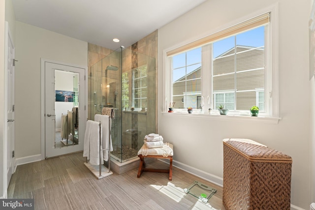 70 Battery Point Dr, Fredericksburg, VA 22406 - bathroom featuring baseboards, healthy amount of natural light, a shower stall, and recessed lighting