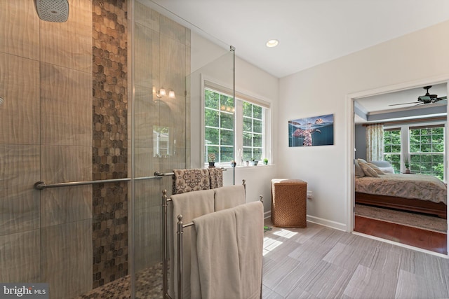 70 Battery Point Dr, Fredericksburg, VA 22406 - ensuite bathroom with healthy amount of natural light, a tile shower, baseboards, and recessed lighting