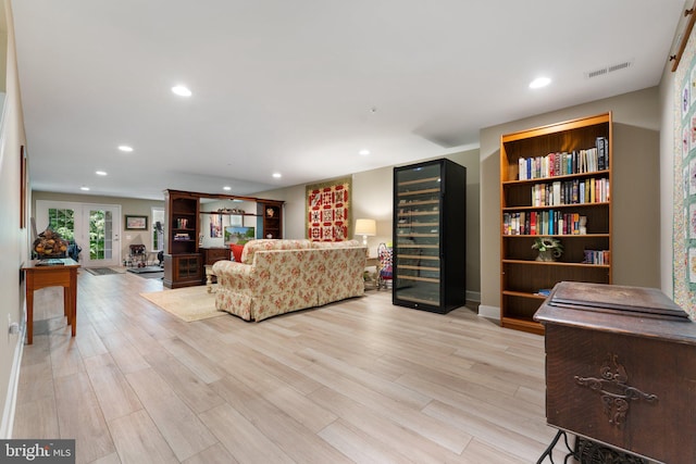 70 Battery Point Dr, Fredericksburg, VA 22406 - living area with wine cooler, light wood-type flooring, recessed lighting, and baseboards