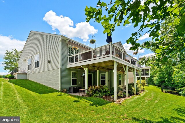 70 Battery Point Dr, Fredericksburg, VA 22406 - back of property with a yard, a deck, a patio, and brick siding
