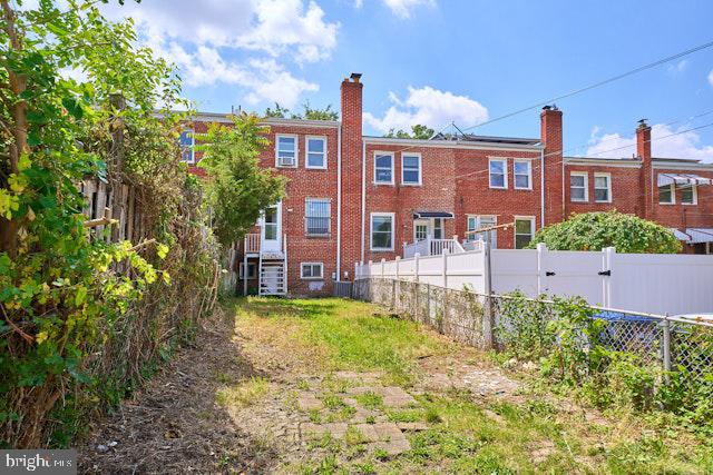 66 Allison St NE, Washington, DC 20011 - rear view of house featuring brick siding