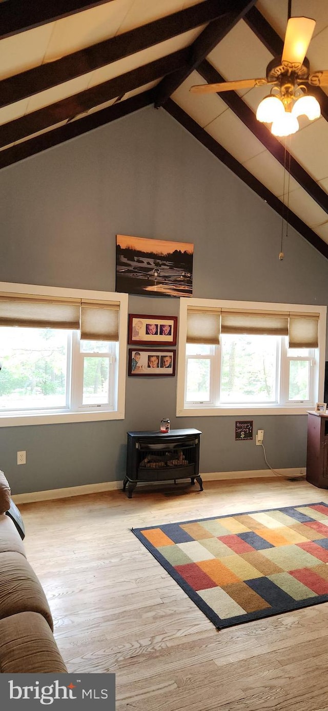 3203 N Lakeshore Dr, Browns Mills, NJ 08015 - living room featuring beam ceiling, high vaulted ceiling, wood finished floors, baseboards, and a ceiling fan