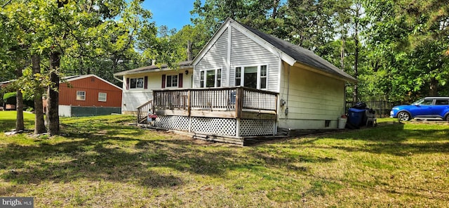 3203 N Lakeshore Dr, Browns Mills, NJ 08015 - view of front of house featuring a wooden deck, a front yard, and view of scattered trees