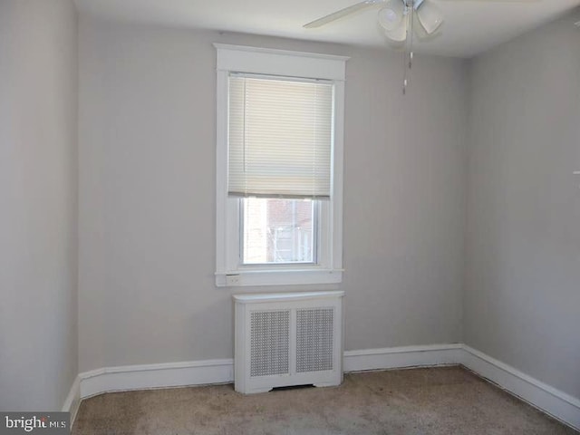 2130 Melvin St, Philadelphia, PA 19131 - empty room with radiator heating unit, carpet, a ceiling fan, and baseboards