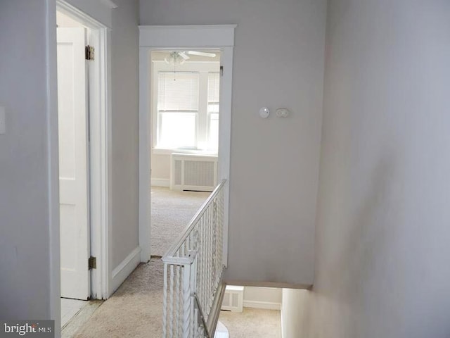 2130 Melvin St, Philadelphia, PA 19131 - hallway featuring light carpet, an upstairs landing, and baseboards