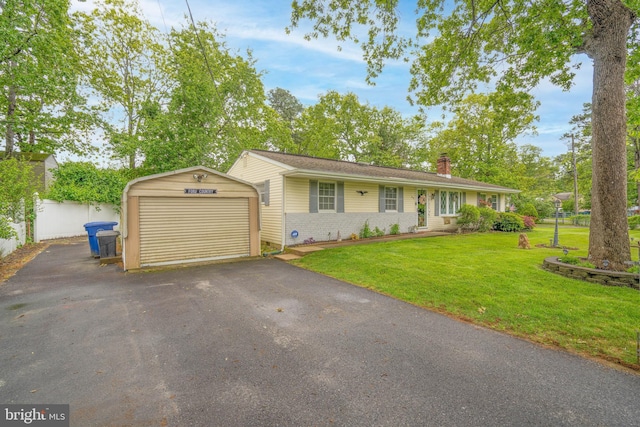 64 Sepulga Dr, Browns Mills, NJ 08015 - ranch-style house with a detached garage, a chimney, brick siding, and asphalt driveway