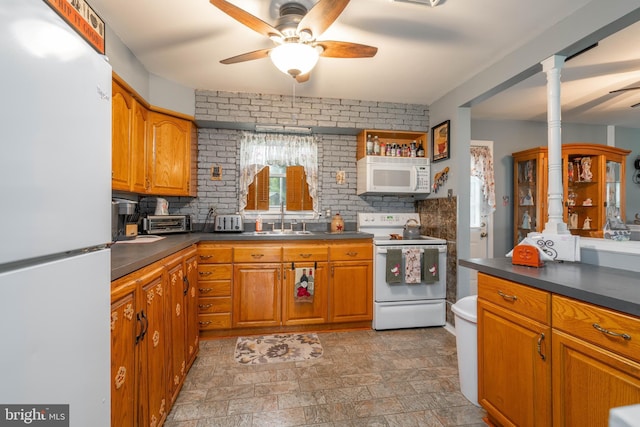 64 Sepulga Dr, Browns Mills, NJ 08015 - kitchen with white appliances, a sink, a ceiling fan, and dark countertops