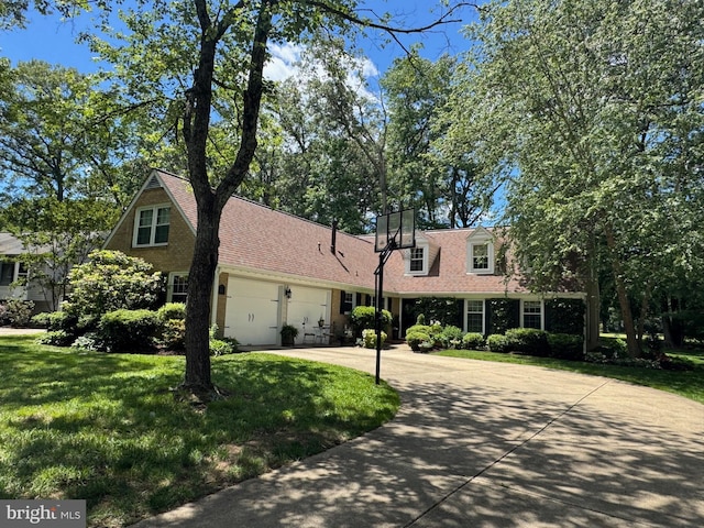 1512 Eton Way, Crofton, MD 21114 - view of front facade with driveway, a garage, a front lawn, and roof with shingles