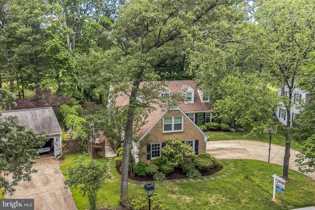 1512 Eton Way, Crofton, MD 21114 - view of front of house featuring a front lawn, brick siding, and concrete driveway